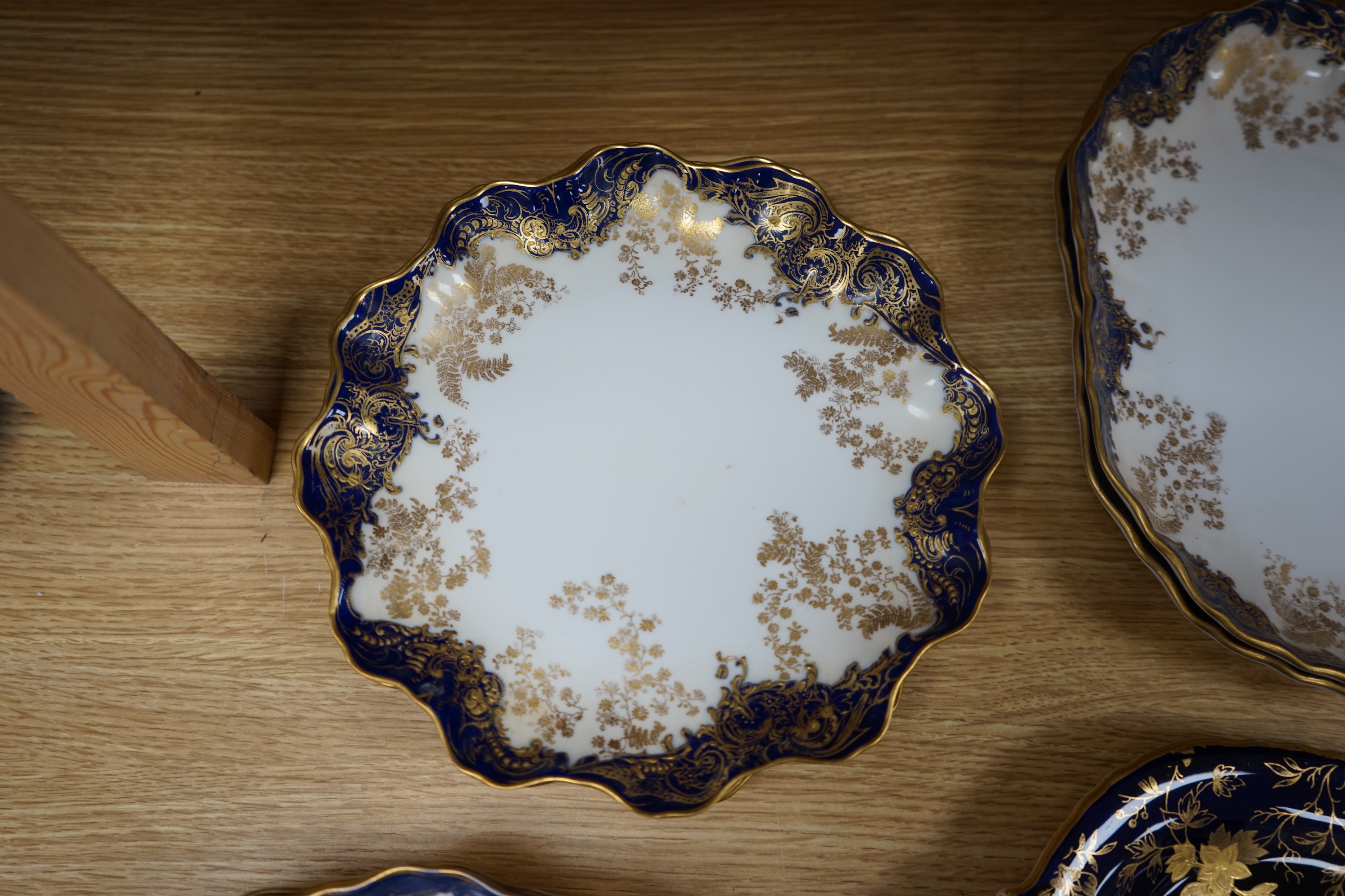 A collection of porcelain to include a Royal Doulton part dessert set, a Limoges gilt oval box and cover and a similar Davenport dish, largest 26cm wide. Condition - mostly fair